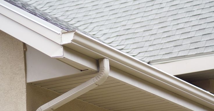 Seamless aluminum gutter run with matching downspout elbow